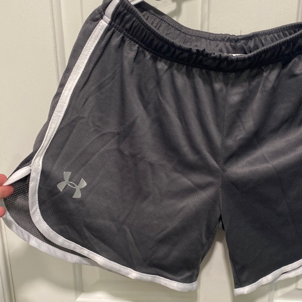 Women’s under armor, athletic shorts, size medium
